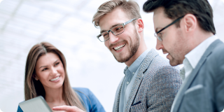 Professionals reviewing health plan options together, comparing ACA vs private health insurance differences.