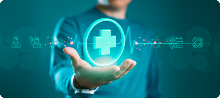Person holding a glowing medical cross icon with digital healthcare and health insurance symbols representing health coverage and medical services.